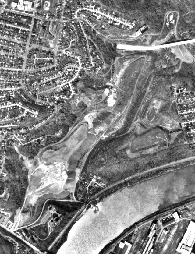 Aerial photograph of the Nine Mile Run valley in 1990, filled by a slag plateau